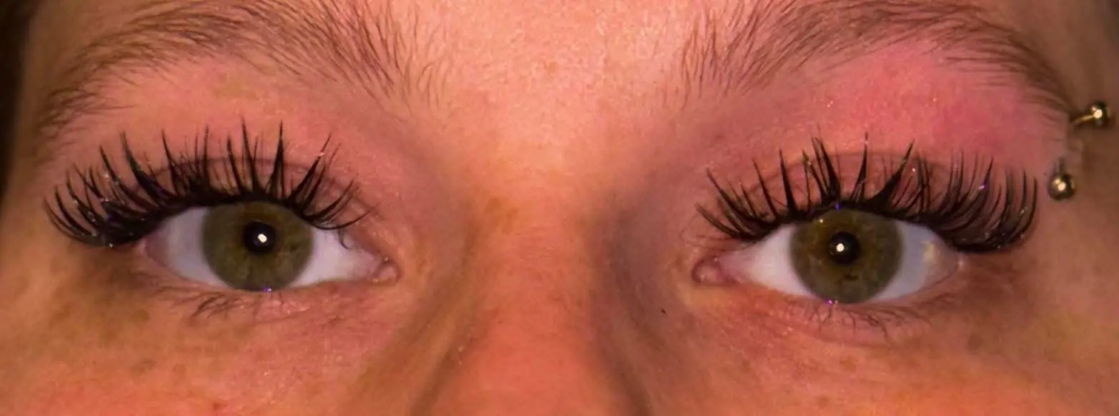 Both eyes with full cluster lashes and pink eyeshadow